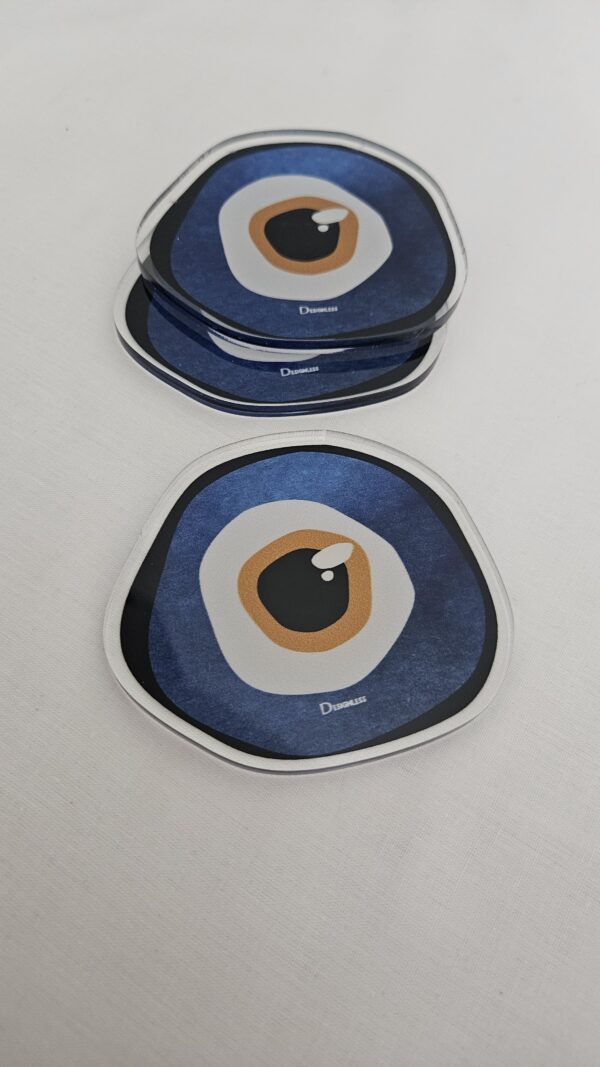 Handcrafted blue evil eye coasters set, featuring a traditional Middle Eastern protective design.